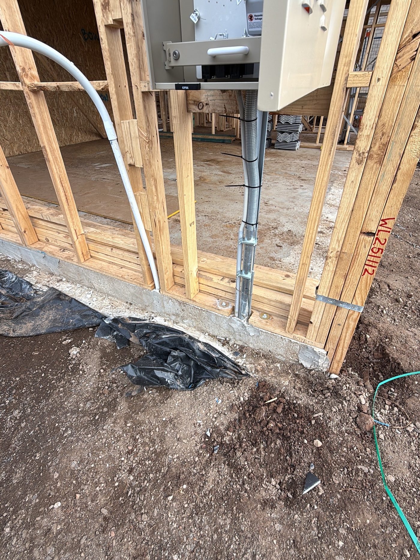 Honeycombing along the slab edge, voids that can weaken the concrete, found during a construction stage inspection in Sunbury